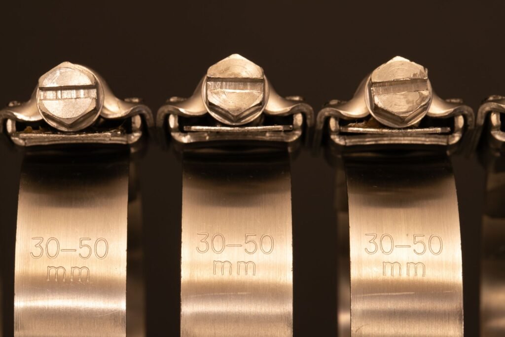 Close-up of metal hose clamps