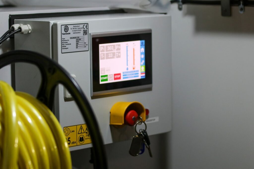 Industrial control panel with a digital display screen, relevant to a Samsung washer 4C or 4E error code