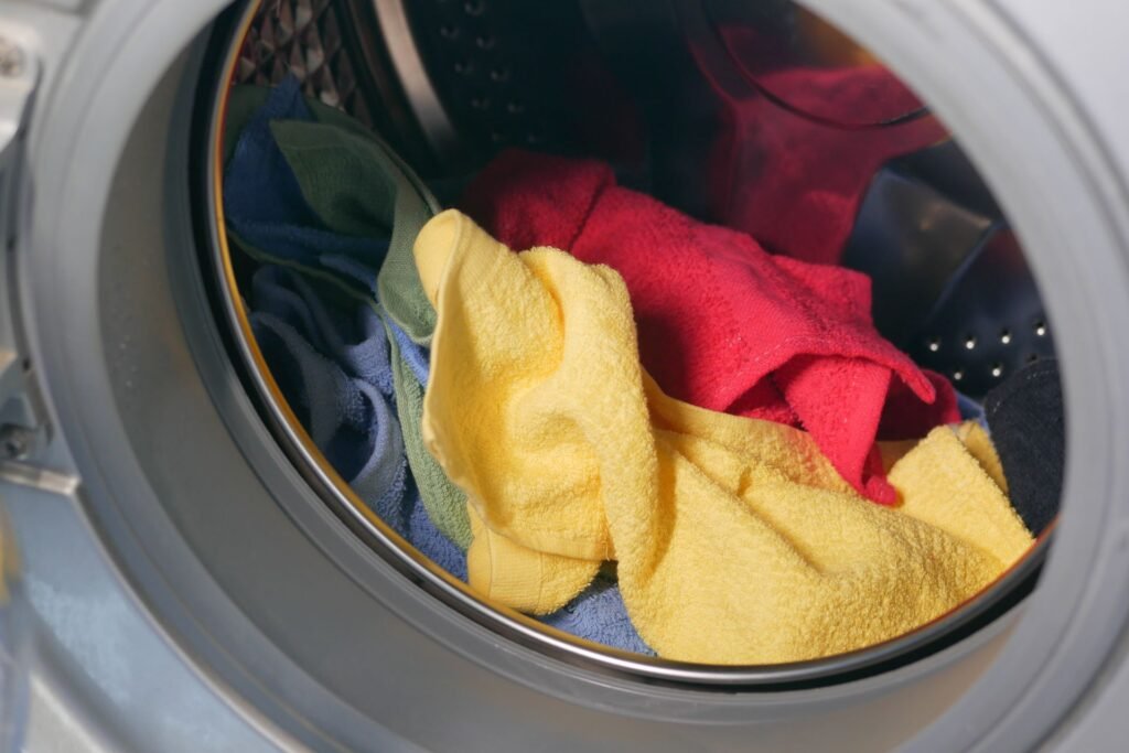 Dry towels loaded in a front-load washer drum, the weight the machine measures during load sensing